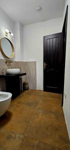 Ένα μπάνιο στο Vila Chalet Traditional Poiana Vladesei