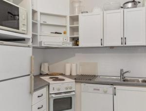 Η κουζίνα ή μικρή κουζίνα στο Apartamento la Casa Tahko +13 φωτογραφίες