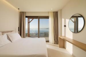 Ένα ή περισσότερα κρεβάτια σε δωμάτιο στο Thaleri Villa