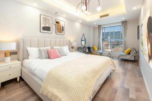 Ένα ή περισσότερα κρεβάτια σε δωμάτιο στο 云深处江景公寓