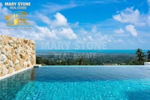une piscine avec vue sur la ville dans l'établissement Savaya Samui (Villa Malena), à Ban Ko Khwan 37 autres photos