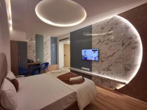 TV a/nebo společenská místnost v ubytování Palette The Moon Hotel Goa