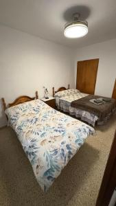 Postel nebo postele na pokoji v ubytování Casa Emilio