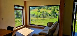 Posezení v ubytování Vila Chalet Modern Poiana Vladesei