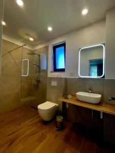 Koupelna v ubytování Vila Chalet Modern Poiana Vladesei