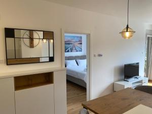 Postel nebo postele na pokoji v ubytování Vrdnik Residence-Apartman 20