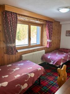 Ένα ή περισσότερα κρεβάτια σε δωμάτιο στο Hotel Paradisia