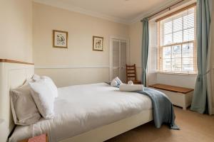 Postel nebo postele na pokoji v ubytování Toll Green View - Elie