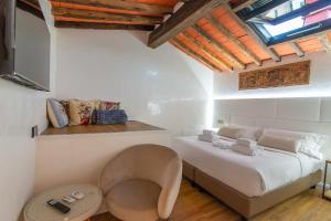 Ένα ή περισσότερα κρεβάτια σε δωμάτιο στο Corte dell'Albero