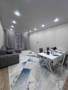 Χώρος καθιστικού στο Апартаменты в ЖК 4YOU