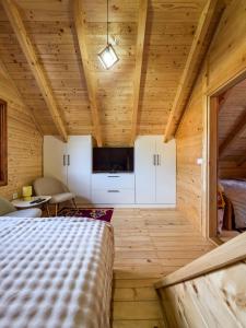 Postel nebo postele na pokoji v ubytování BRVNARE MASA i MEDO