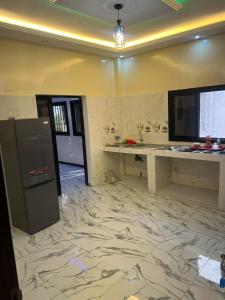 TV a/nebo společenská místnost v ubytování Appartement meublé, confortable et abordable à Saint-Louis + 10 fotografií