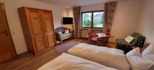 Postel nebo postele na pokoji v ubytování Gästehaus Reichart