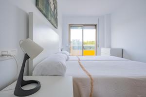 Postel nebo postele na pokoji v ubytování Apartamentos Proamar