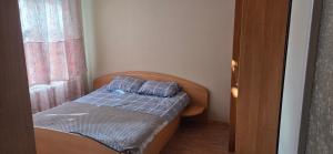 Ένα ή περισσότερα κρεβάτια σε δωμάτιο στο Flat