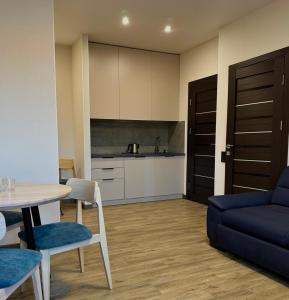 Η κουζίνα ή μικρή κουζίνα στο Апарт-готель "Модерн 24"