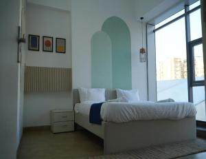 Ένα ή περισσότερα κρεβάτια σε δωμάτιο στο spectrum mall +21 φωτογραφίες