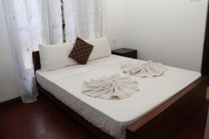 Giường trong phòng chung tại Thal Sewana