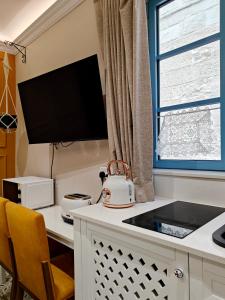 TV a/nebo společenská místnost v ubytování Zebbuga Deluxe Lavish Suite 3