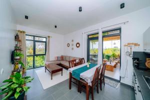 Posezení v ubytování Kejani Paradise - Tropical serviced Condo at The Soul, Paje