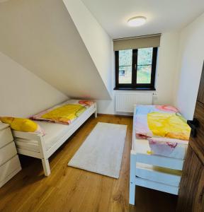 Postel nebo postele na pokoji v ubytování Nature Apartment