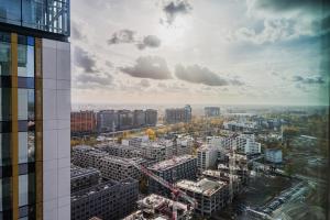 a view of a city from a building at Towarowa Towers SkyLine View in Warsaw