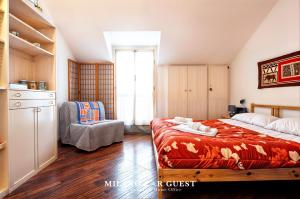 Postel nebo postele na pokoji v ubytování MILANO FOR GUEST- Duomo Apartment