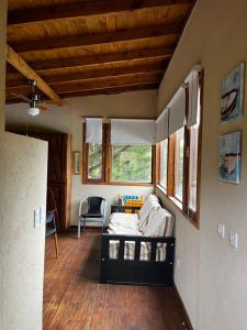 Ένα ή περισσότερα κρεβάτια σε δωμάτιο στο Cabañas SKY