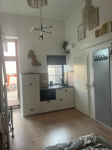 Kuchyň nebo kuchyňský kout v ubytování Freigeist Boho