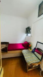 Ένα ή περισσότερα κρεβάτια σε δωμάτιο στο Gavari India's Delhi Hostel