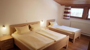Postel nebo postele na pokoji v ubytování Ferienbauernhof Mehlbach + 37 fotografií