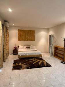 Postel nebo postele na pokoji v ubytování AS Appartement meublé