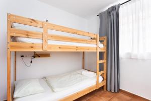 Ένα ή περισσότερα κρεβάτια σε δωμάτιο στο Tabaiba Guesthouse +88 φωτογραφίες