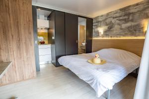 Postel nebo postele na pokoji v ubytování camping Le Médiéval