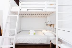 Ένα ή περισσότερα κρεβάτια σε δωμάτιο στο Tabaiba Guesthouse