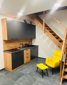 O bucătărie sau chicinetă la Apartmány Příkosice