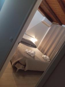 Postel nebo postele na pokoji v ubytování La Praiola