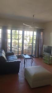 Postel nebo postele na pokoji v ubytování Appartement Saly plage