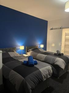 Postel nebo postele na pokoji v ubytování Modern 4 Bed Ensuite Home Fast Wi-Fi Parking