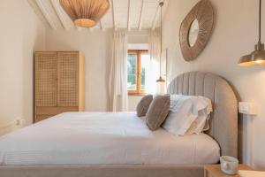 Postel nebo postele na pokoji v ubytování Casa Del Pozzo