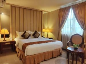 Ένα ή περισσότερα κρεβάτια σε δωμάτιο στο Olympic Hotel +22 φωτογραφίες