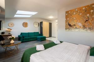 Postel nebo postele na pokoji v ubytování AUSTRIAN APART HOTEL