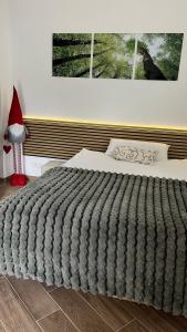 Ένα ή περισσότερα κρεβάτια σε δωμάτιο στο Studio Ohlendorf 3 Min zur A7