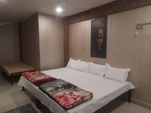 Voodi või voodid majutusasutuse Yadav homestay toas