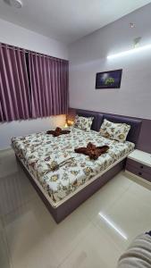 Giường trong phòng chung tại SKYLîNE SUITE-5 +3 ảnh