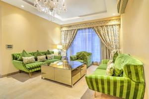 Et opholdsområde på Palette Hotel Cotts Villa by CheckIn Vasant Kunj New Delhi