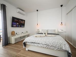 Ένα ή περισσότερα κρεβάτια σε δωμάτιο στο Sweet Escape