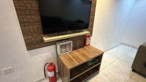 TV a/nebo společenská místnost v ubytování شقق الحمراء 1