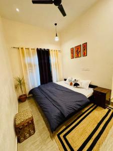 Postel nebo postele na pokoji v ubytování Vin's Villa & caffe