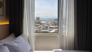 Una cama o camas en una habitación de Cattleya BNB Rentals 31 fotos más